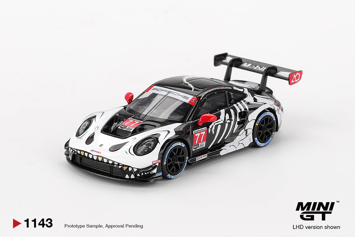 Mini GT Porsche 911 GT3 R #77 AO Racing 2025 IMSA Petit Le Mans Skeleton Rexy Halloween 1:64 Scale Diecast Model, view 2 | Toyfessional