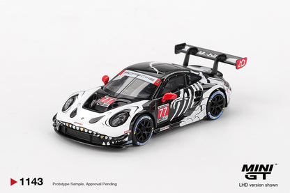 Mini GT Porsche 911 GT3 R #77 AO Racing 2025 IMSA Petit Le Mans Skeleton Rexy Halloween 1:64 Scale Diecast Model, view 2 | Toyfessional