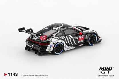 Mini GT Porsche 911 GT3 R #77 AO Racing 2025 IMSA Petit Le Mans Skeleton Rexy Halloween 1:64 Scale Diecast Model, view 3 | Toyfessional